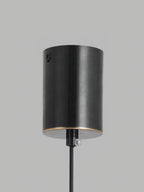 Close-up of the black cylinder canopy on the Clérachic Alabaster Globe Pendant Light, with its fixing screw and cord grip for the ceiling.