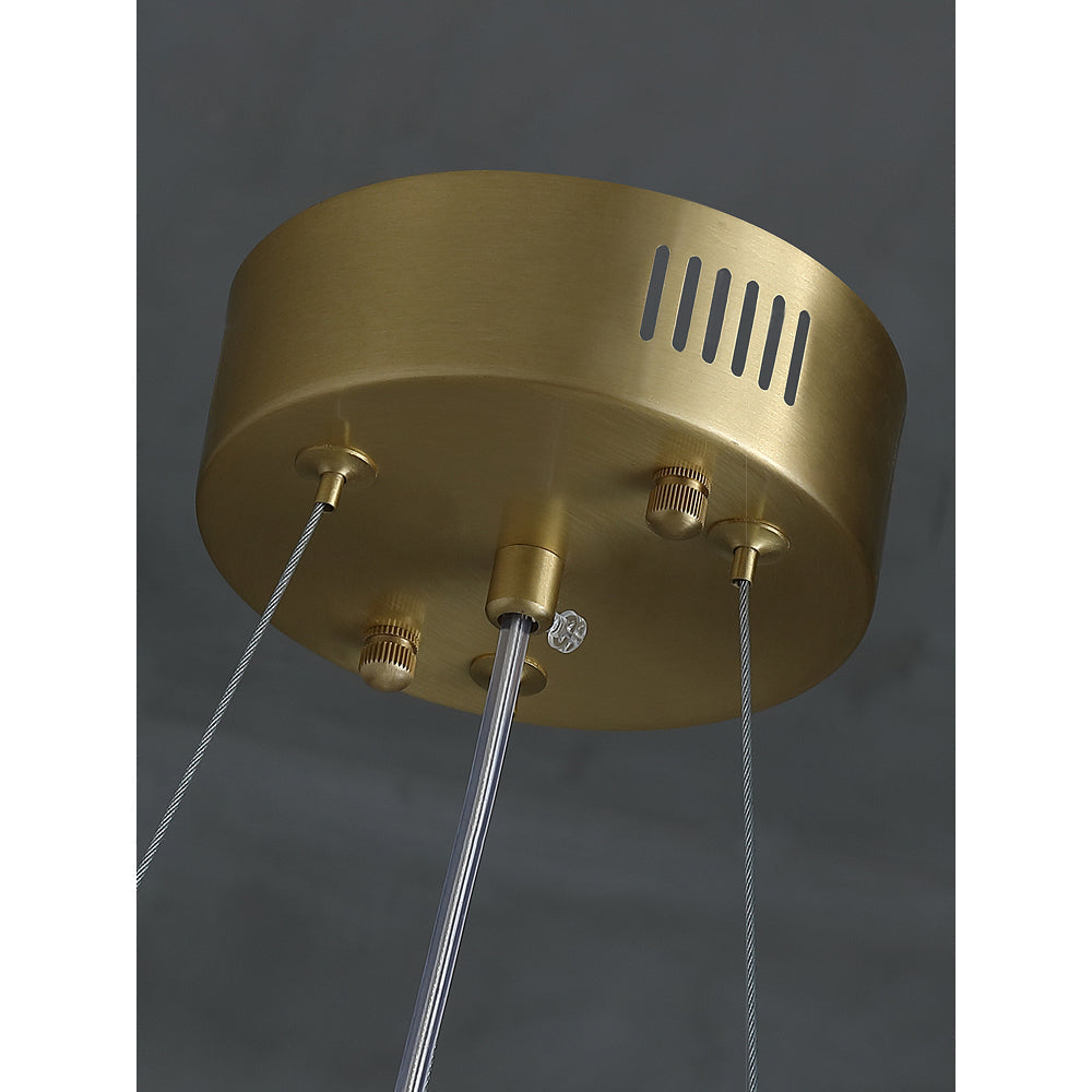 The round brass ceiling canopy of the Clérachic Alabaster Globe Ring Chandelier, with vent slots and three steel cable grips.