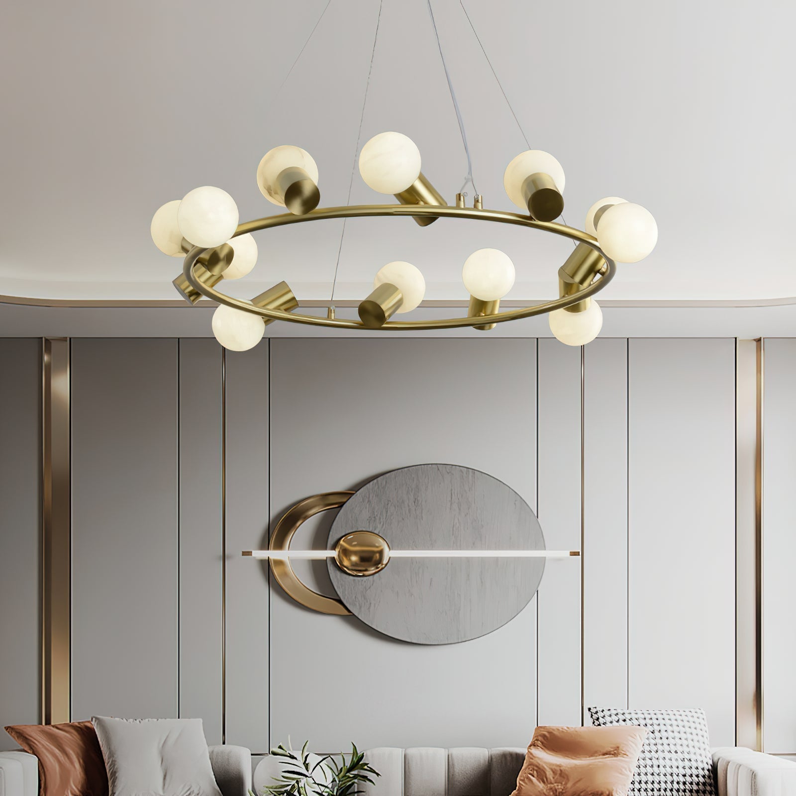 Clérachic Alabaster Globe Ring Chandelier glowing above a panelled grey wall with brass trim in a formal sitting room.