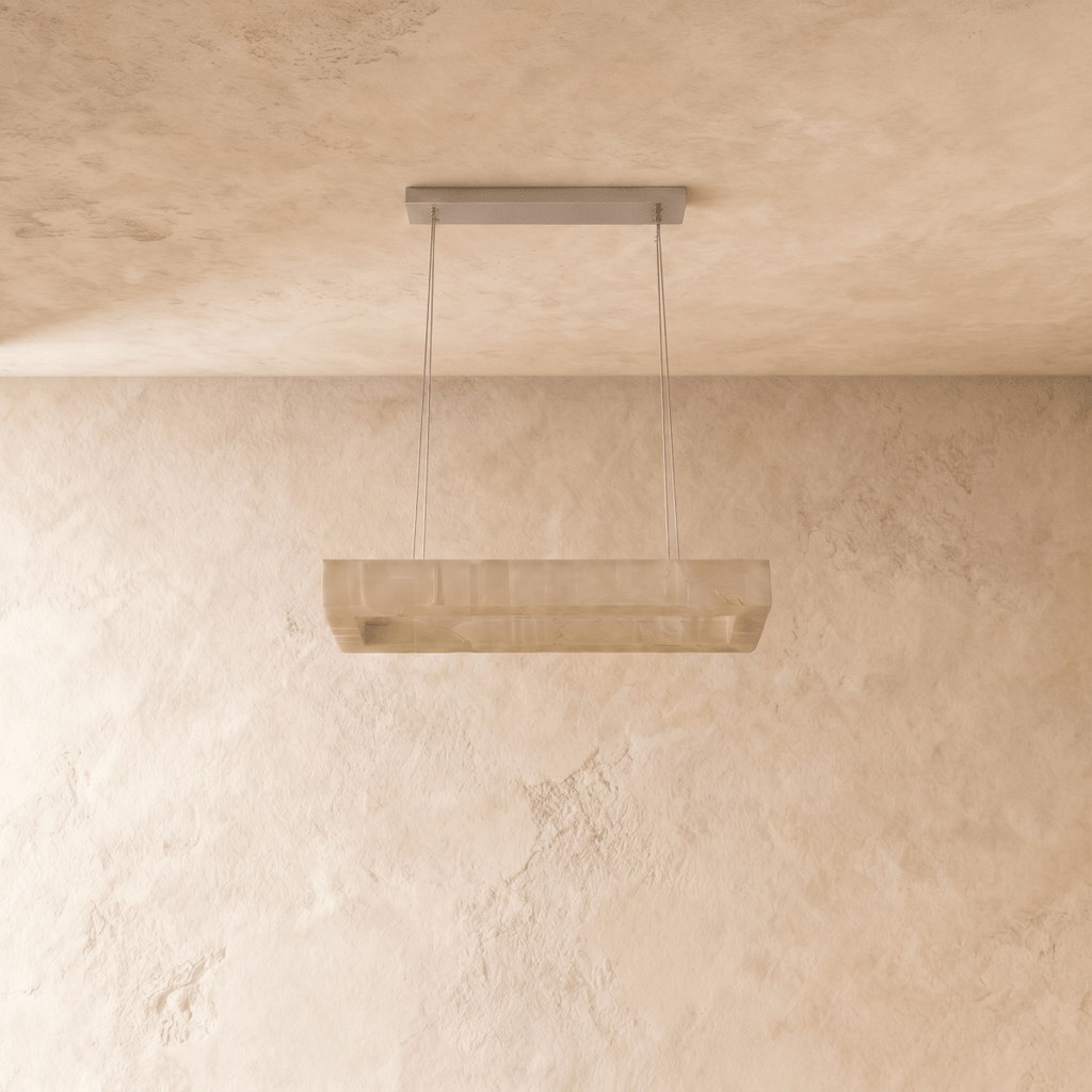Clérachic rectangular alabaster chandelier switched off, showing the pale veined stone shade on two cables.