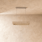 Clérachic rectangular alabaster chandelier switched off, showing the pale veined stone shade on two cables.