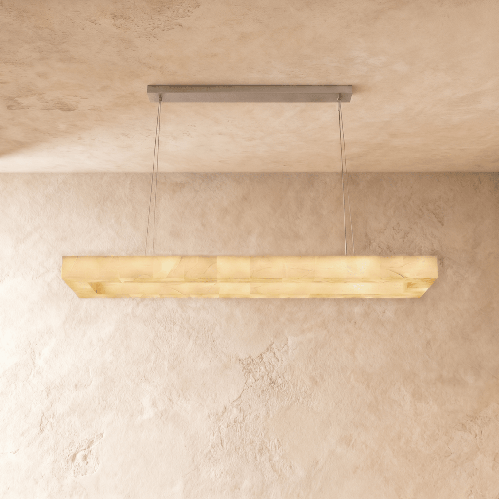 Clérachic longest rectangular alabaster chandelier, a stepped stone shade on slender cables in a warm light.