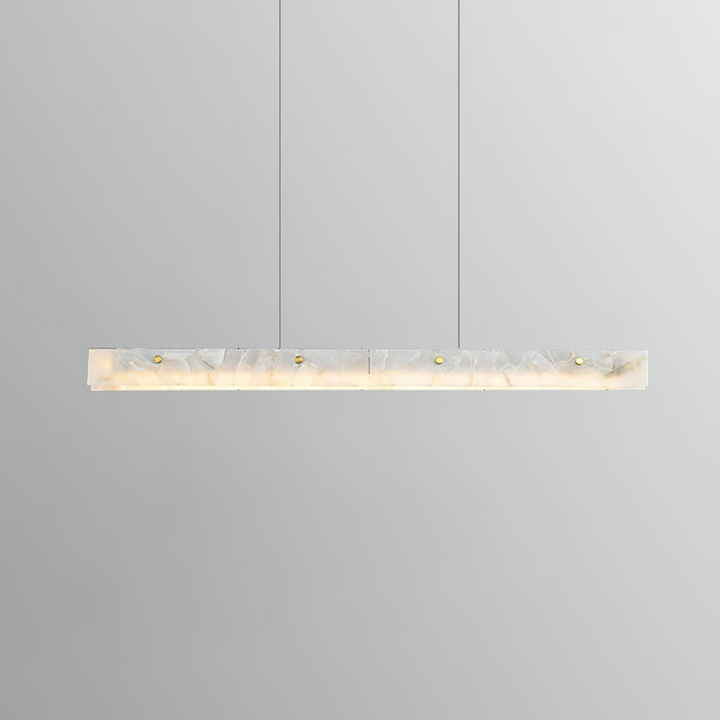 Clérachic linear bar lit and level in a soft grey studio, the alabaster reading warm and evenly diffused end to end.