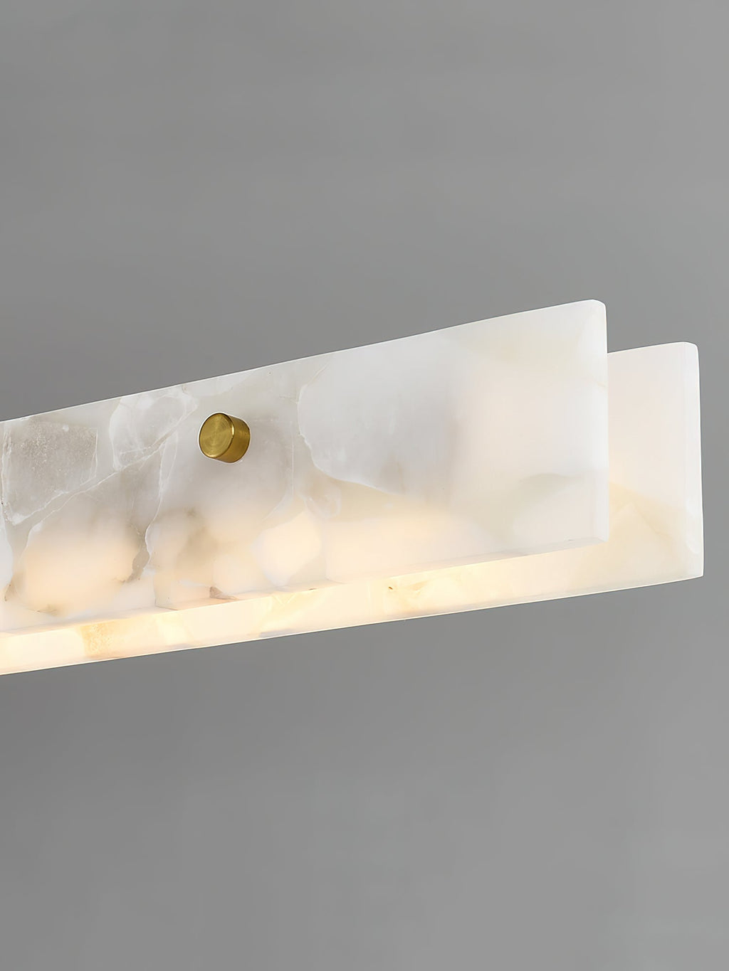 The Clérachic bar cropped at one end, showing the squared stone return and a single brass fixing on the face.
