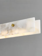 The Clérachic bar cropped at one end, showing the squared stone return and a single brass fixing on the face.