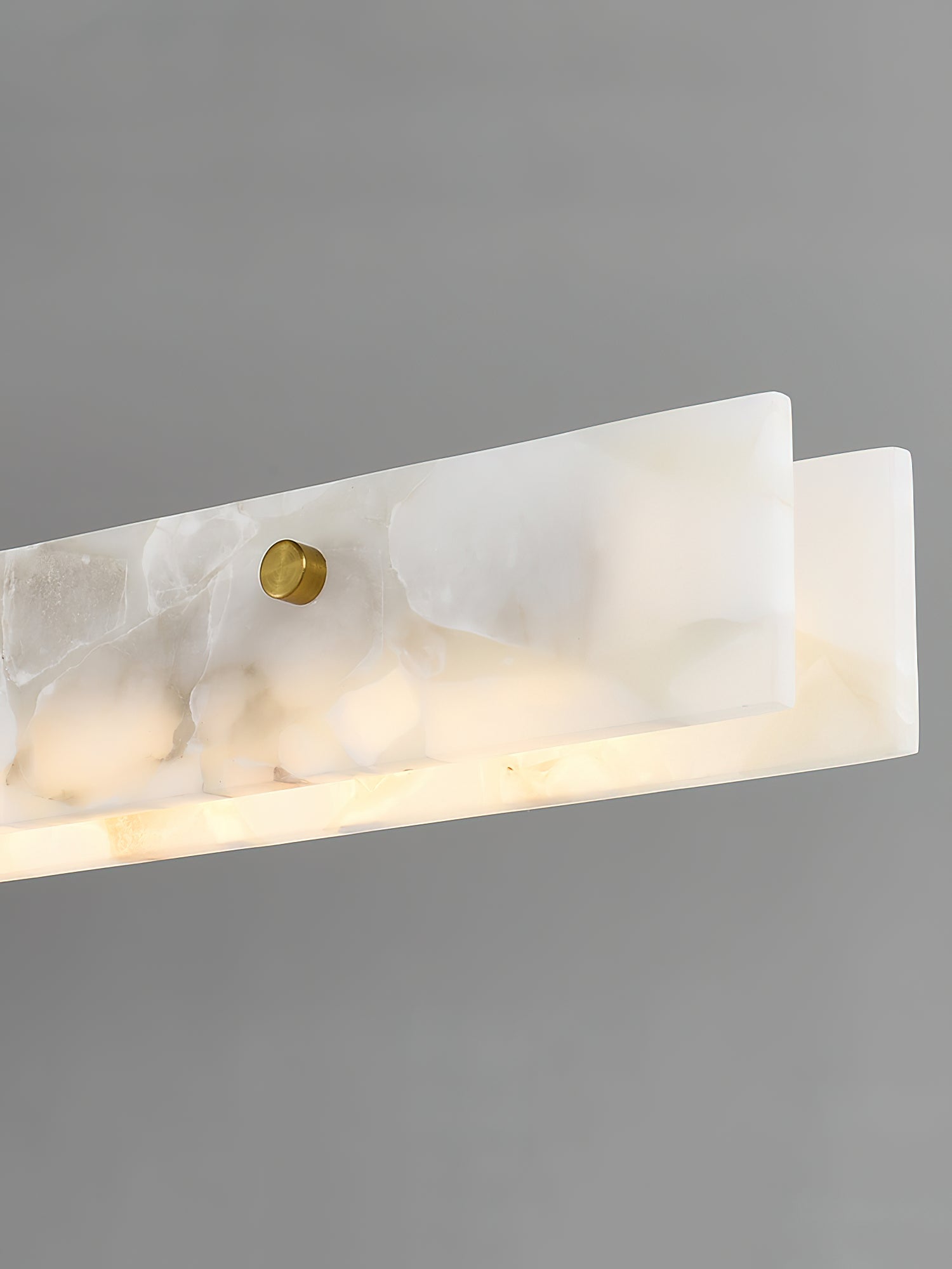 The Clérachic bar cropped at one end, showing the squared stone return and a single brass fixing on the face.