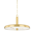 Side view of the Clérachic Alabaster Pendant Light, the shallow brass dome flaring wide over its pale stone diffuser above a table.