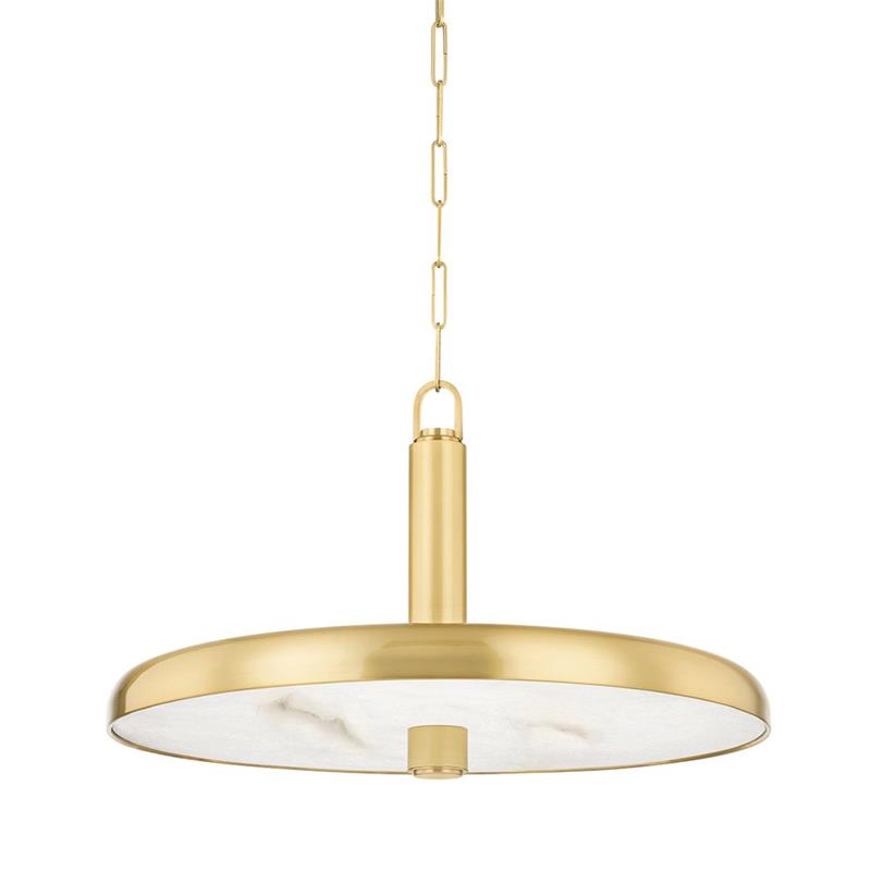 Side view of the Clérachic Alabaster Pendant Light, the shallow brass dome flaring wide over its pale stone diffuser above a table.
