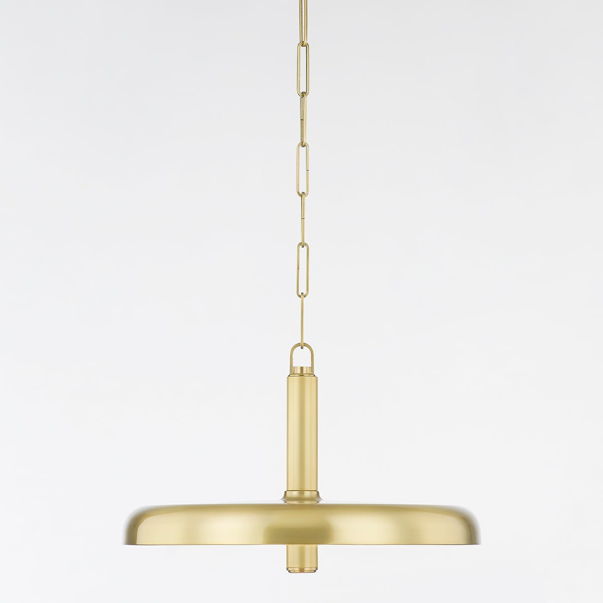 Side-on view of the Clérachic Alabaster Pendant Light, its brass dome shown from above the rim as it would read from across a room.