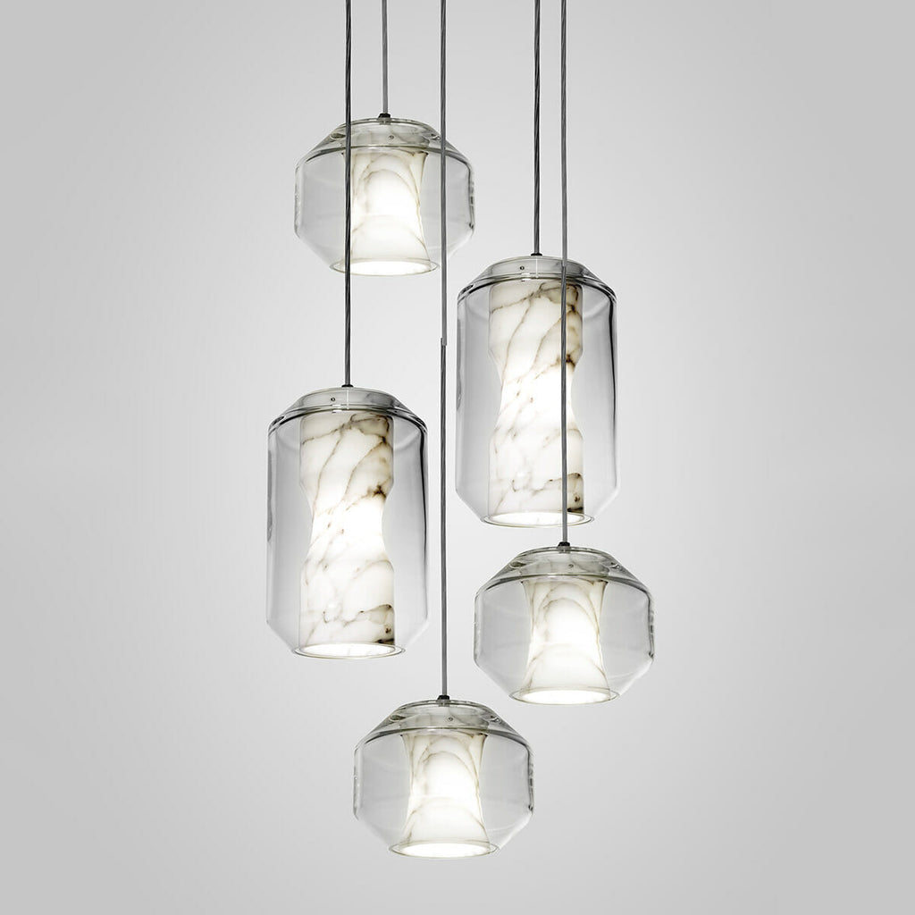 Five Clérachic Alabaster Pendant Lights lit in a mixed-size cluster, showing how the two profiles read hung side by side.