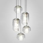 Five Clérachic Alabaster Pendant Lights lit in a mixed-size cluster, showing how the two profiles read hung side by side.