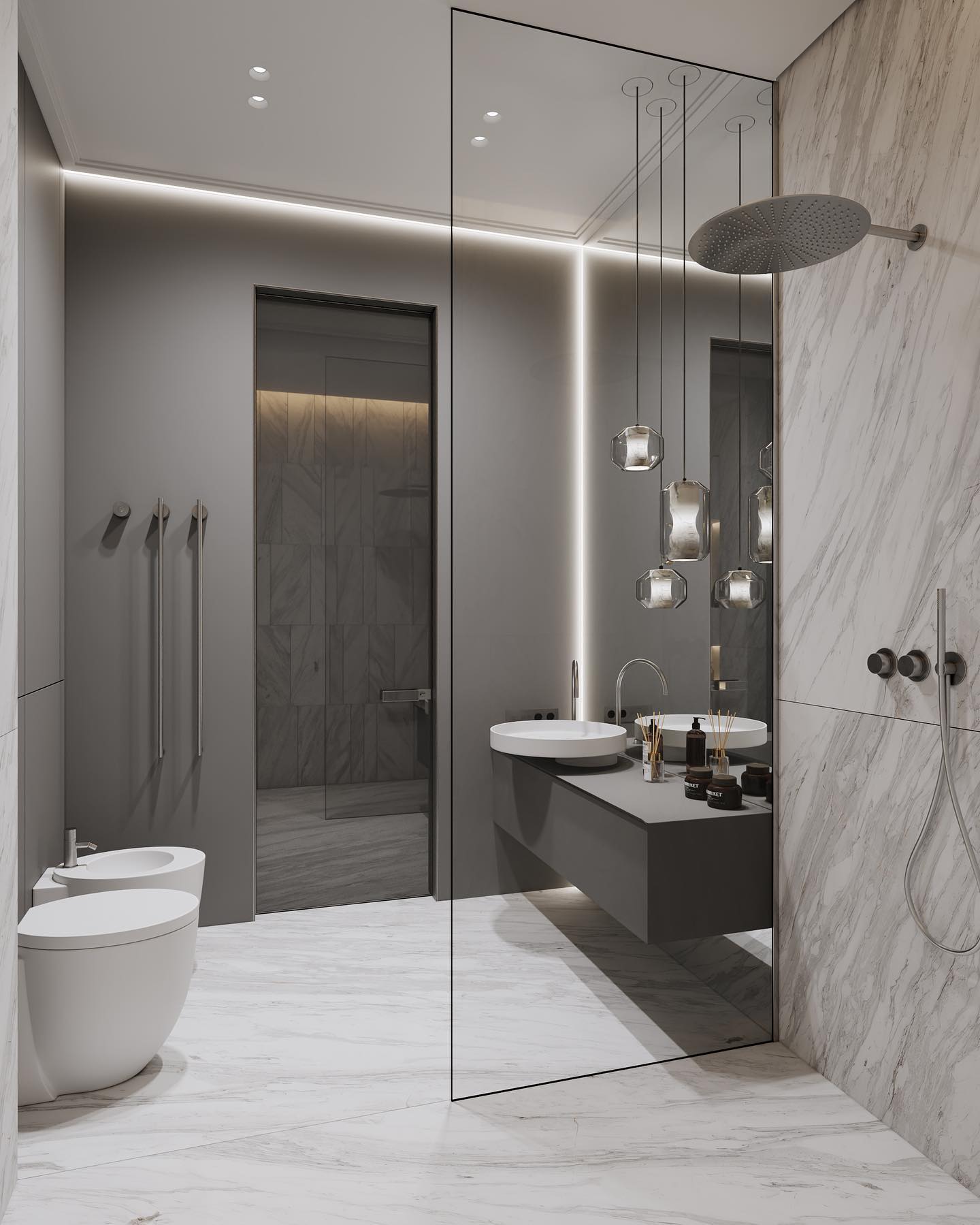 Three Clérachic Alabaster Pendant Lights hung in a row over a floating washstand against a book-matched marble wall.