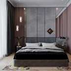 Two Clérachic Alabaster Pendant Lights at staggered drops beside a bed, lighting a bedside table in a panelled bedroom.