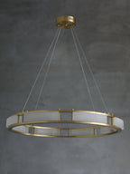 Clérachic Alabaster Ring Chandelier shown unlit at full drop, four clear cables running up to a brass ceiling canopy.