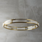 Unlit Clérachic Alabaster Ring Chandelier viewed from above, brass posts spacing the pale alabaster panels around the ring.