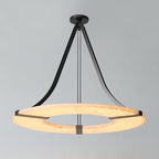 The Clérachic Alabaster Ring Chandelier held flat beneath its ceiling canopy, veined stone catching the light on a grey backdrop.