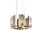Unlit three-quarter view of the Clérachic Alabaster Ring Chandelier, where the warm metal ring already carries the room.