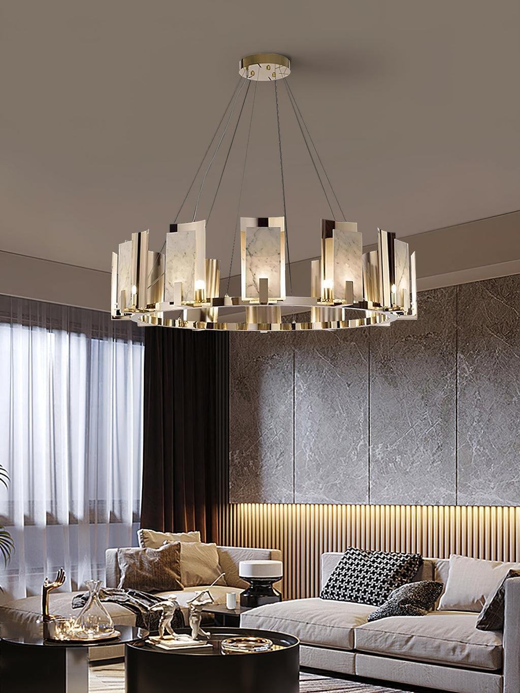 Clérachic Alabaster Ring Chandelier over a cream sofa, its stone panels glowing against a silver-leaf wall and sheer curtains.