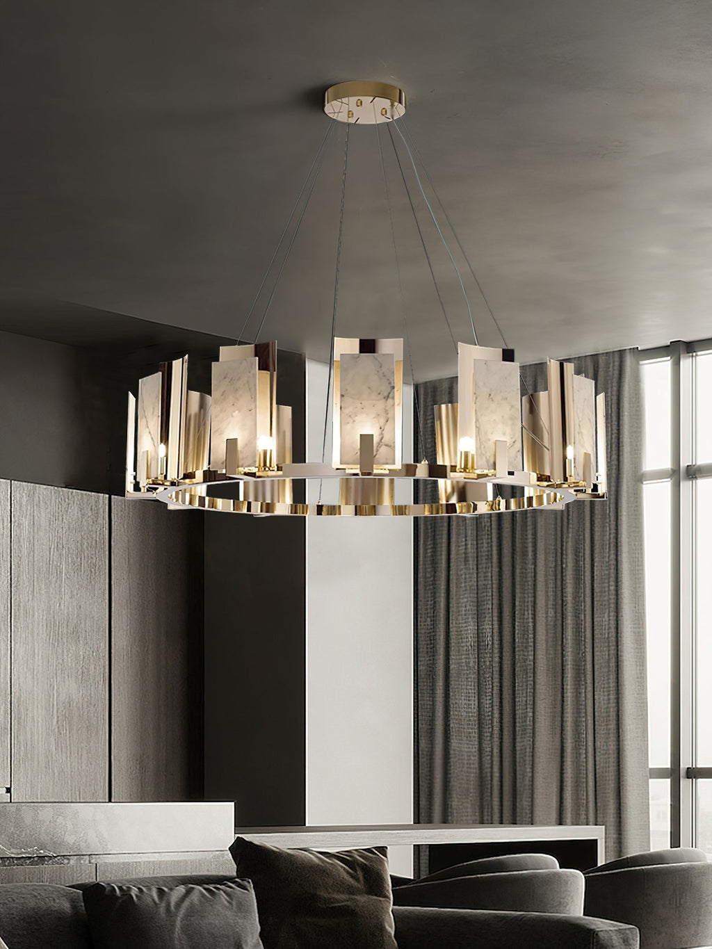 Clérachic Alabaster Ring Chandelier hung low in a grey lounge, the polished ring mirroring the lamplight along its outer band.