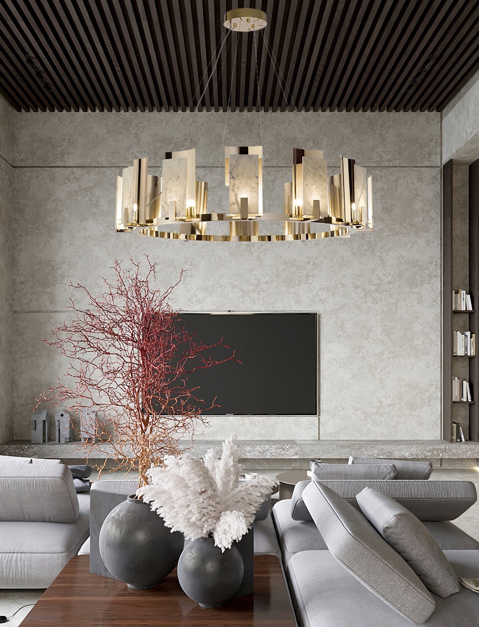 Clérachic Alabaster Ring Chandelier lighting a concrete-walled lounge, hung under a slatted timber ceiling above the seating.