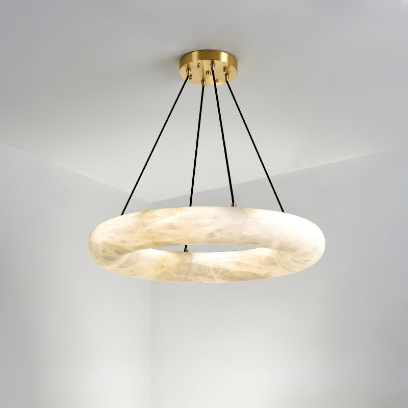 Clérachic Alabaster Ring Chandelier at its larger diameter, the cords fanning out from a compact brass ceiling canopy.