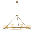 The Clérachic Alabaster Ring Chandelier lit, all ten stone cones glowing warm along the wide gold rim.