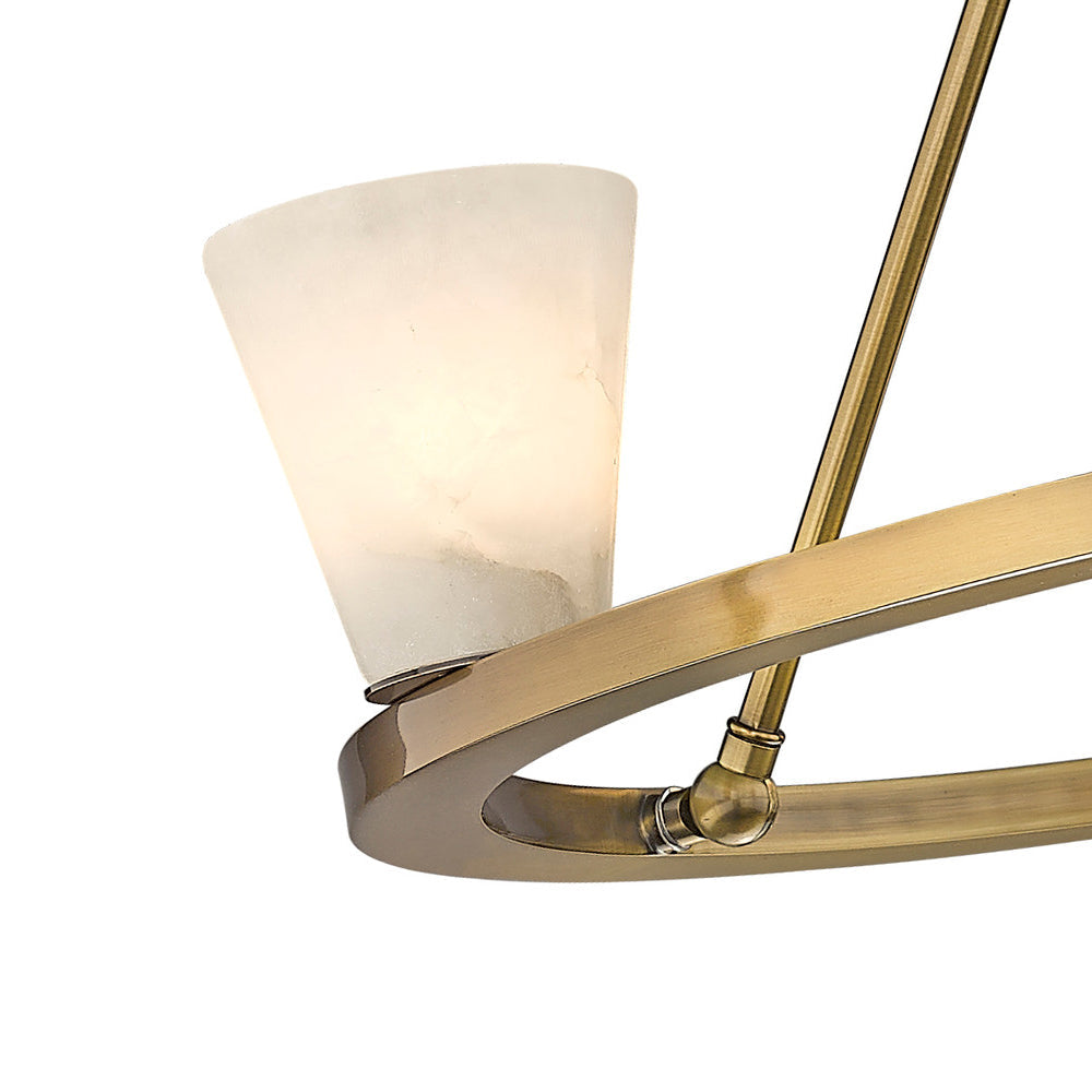 Close detail of the Clérachic Alabaster Ring Chandelier, one stone cone beside the polished rim and its ball-jointed stay.
