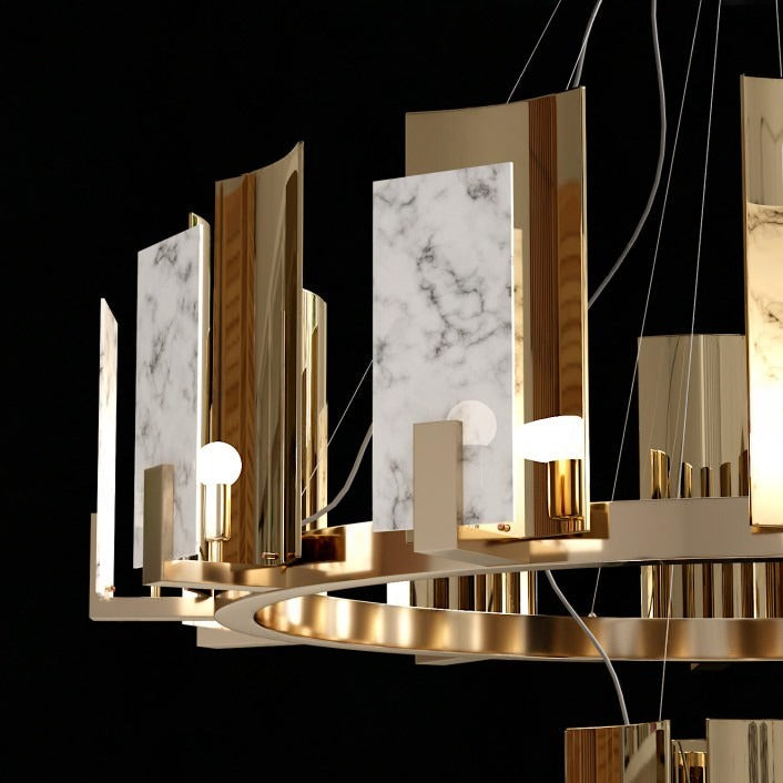 Detail of the Clérachic Alabaster Ring Chandelier: natural alabaster panels with grey veining set beside polished copper-toned shields on the ring.
