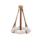 Clérachic Alabaster Ring Pendant Light photographed on a white background, showing the full drop from brass canopy to stone ring.