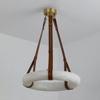 Full drop of the Clérachic Alabaster Ring Pendant Light from ceiling canopy to ring, showing how far the leather straps hang.