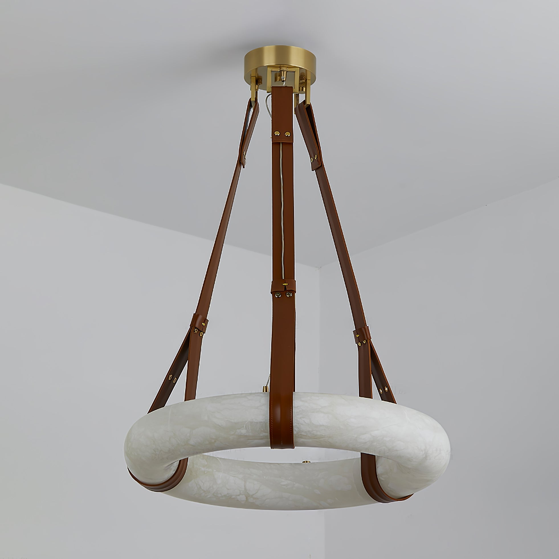 Full drop of the Clérachic Alabaster Ring Pendant Light from ceiling canopy to ring, showing how far the leather straps hang.