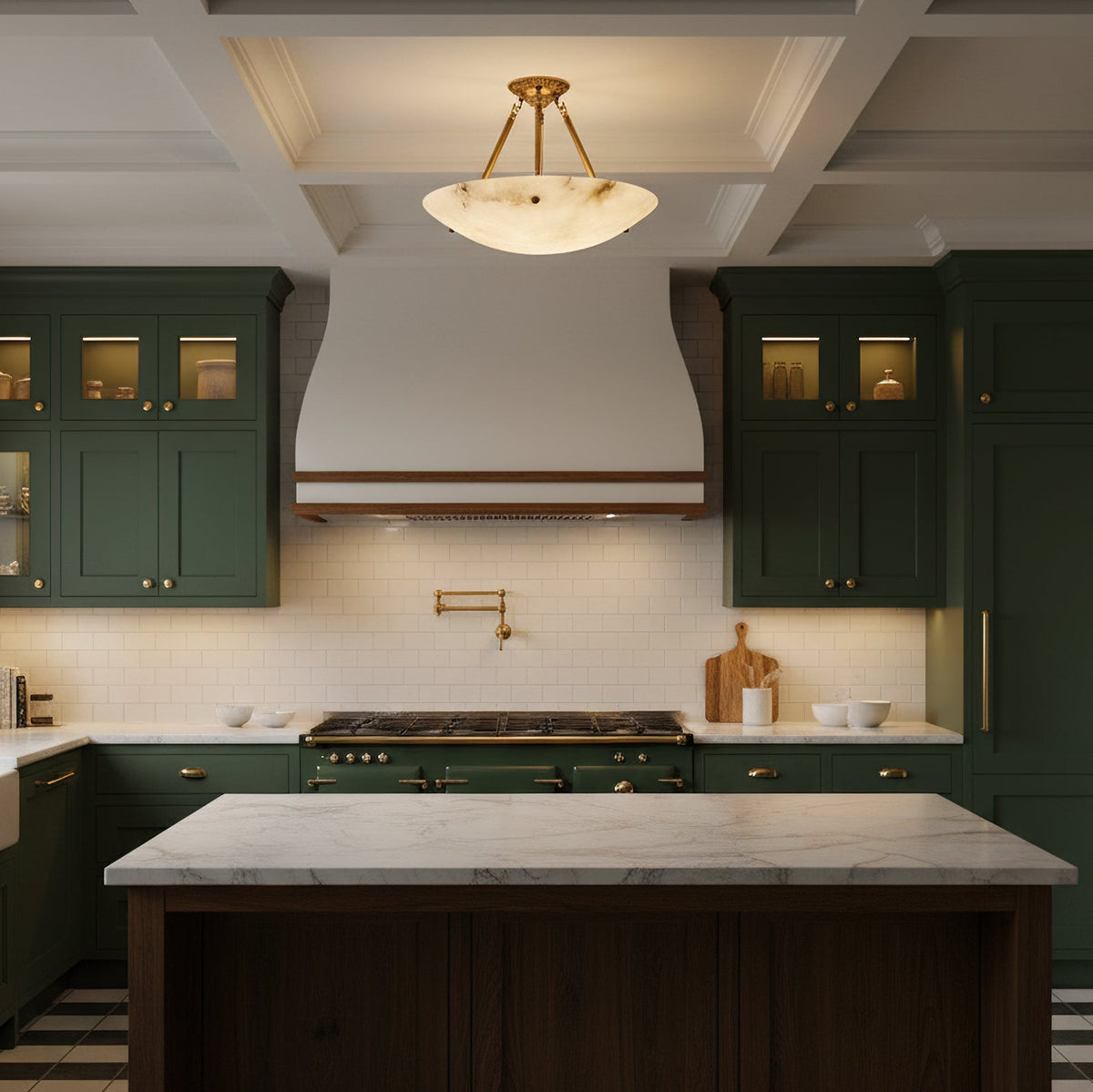 The Clérachic alabaster semi-flush light hangs above a marble kitchen island, with dark green cabinets and a white range hood behind.