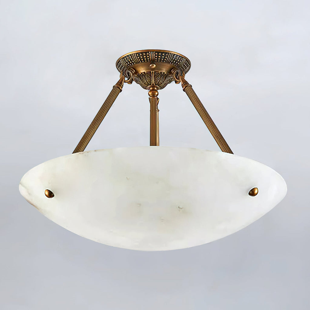 Unlit, the cool white alabaster bowl of this Clérachic ceiling light shows soft grey veining on a pale grey backdrop.