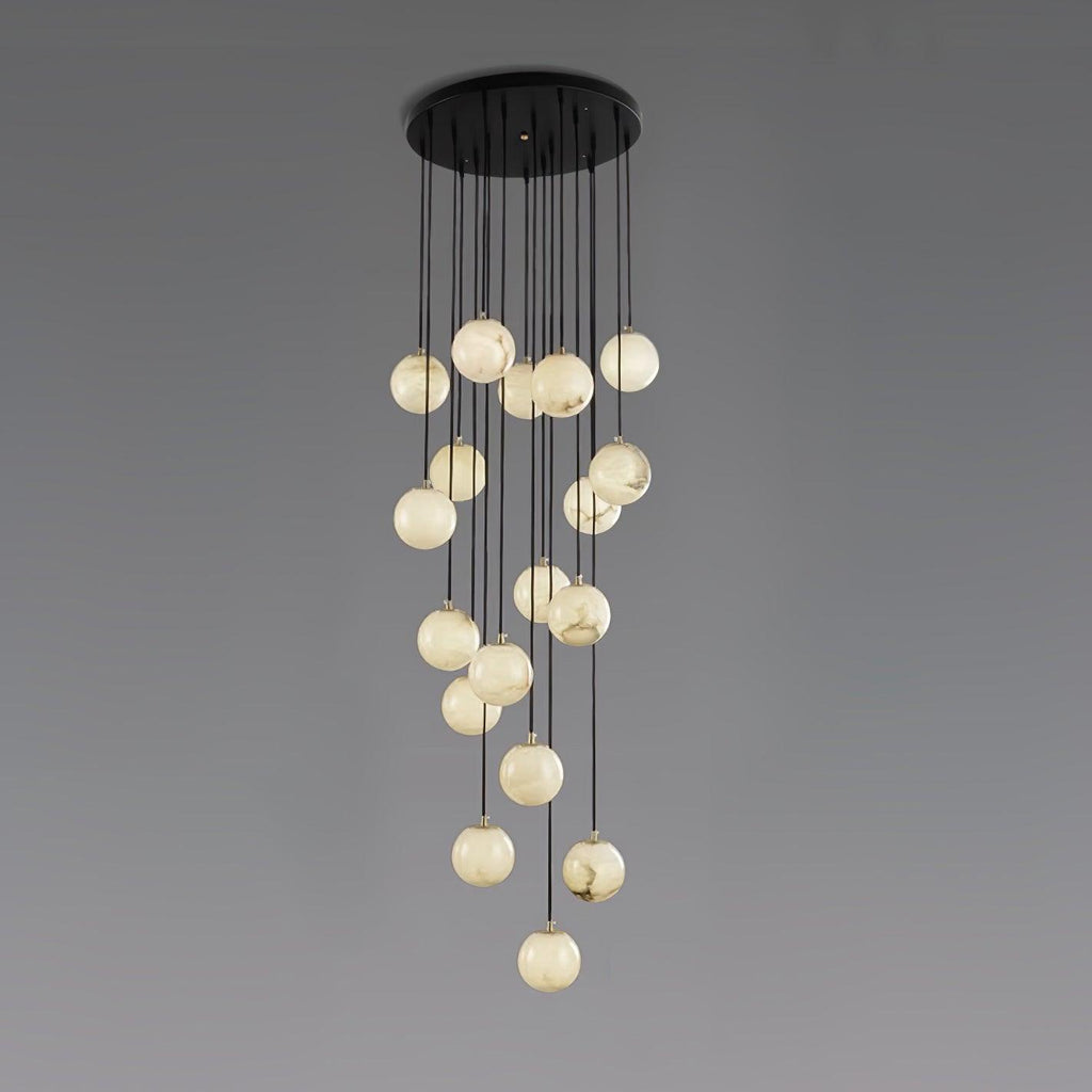 Clérachic alabaster sphere cluster hanging from a round black canopy against a soft grey backdrop, the spheres at many different heights.