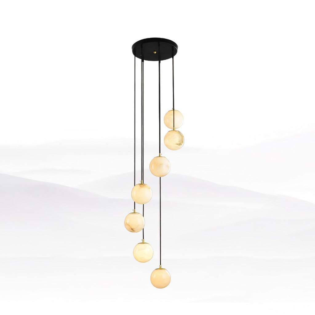 Seven Clérachic alabaster spheres at stepped heights from a round black canopy, in front of a faint misty landscape.