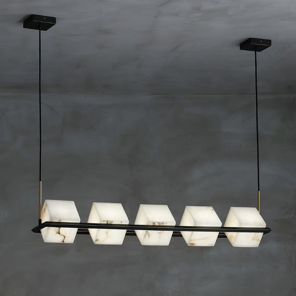 The linear Clérachic box chandelier, five alabaster cubes threaded along one long black bar.