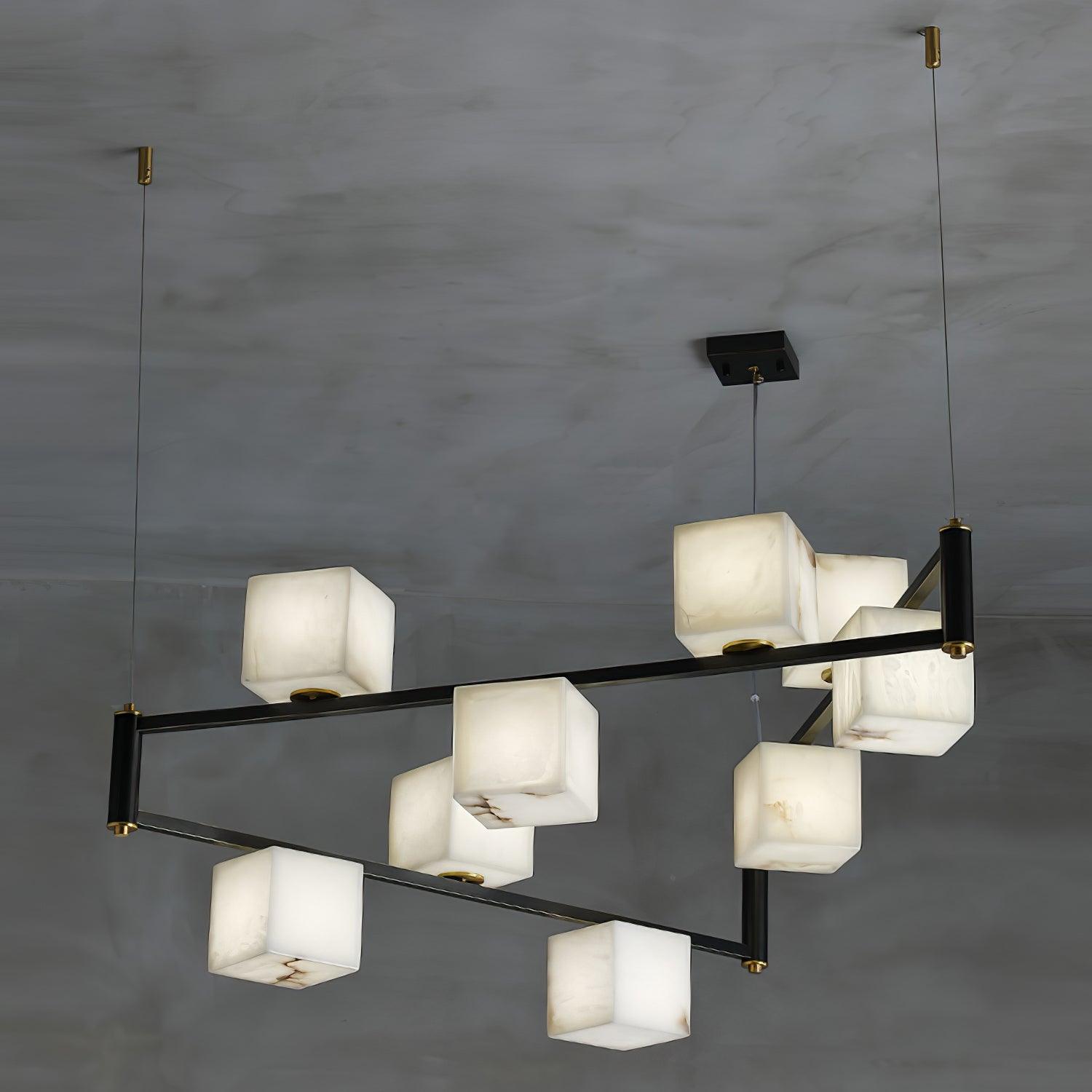 Clérachic box chandelier at its largest, ten cubes staggered over a deep black armature.