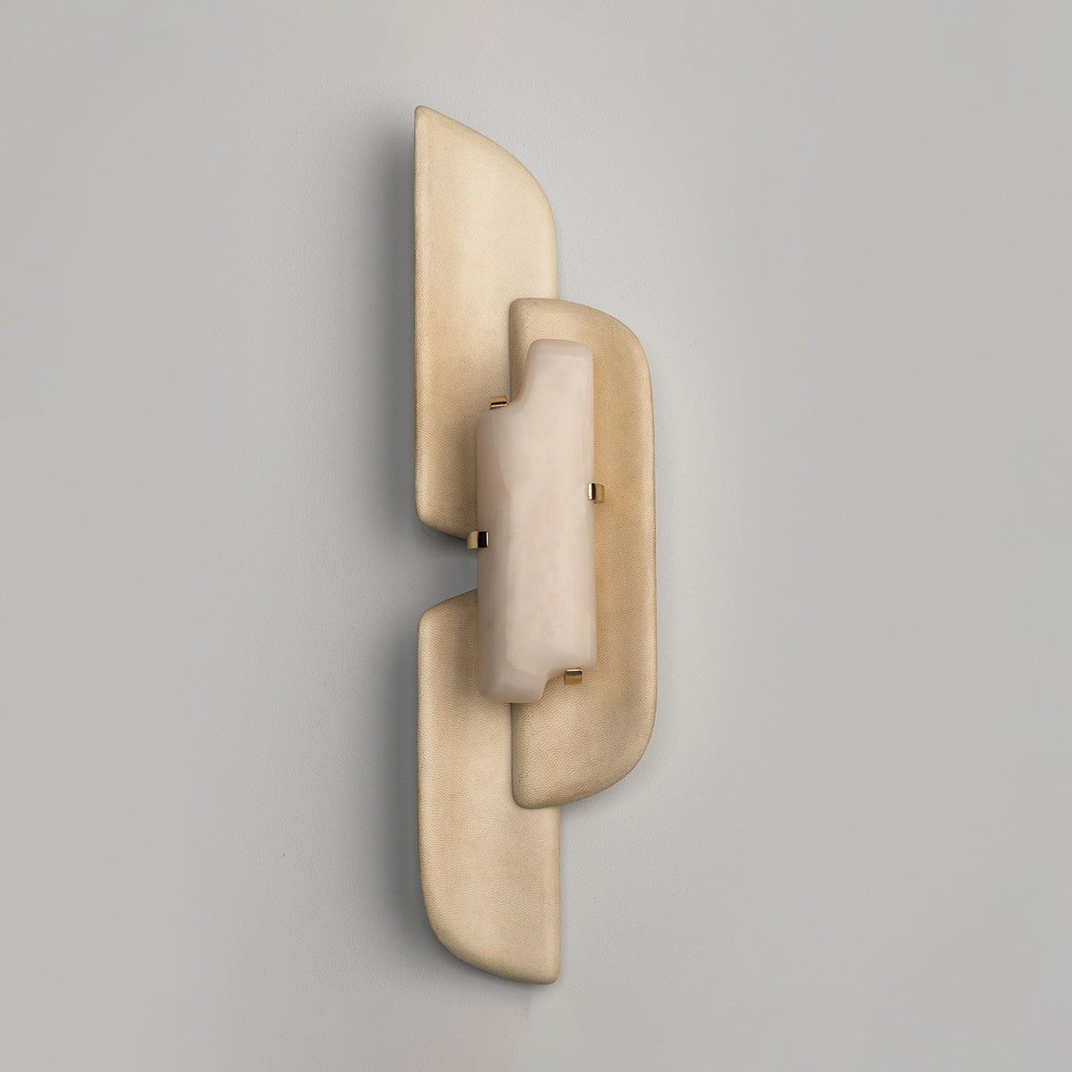 The same Clérachic wall lamp switched off on a grey wall, its alabaster panel pale and its beige layers overlapping.