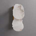 Clérachic two-light wall lamp unlit, white veined alabaster panels on a brushed brass backplate.