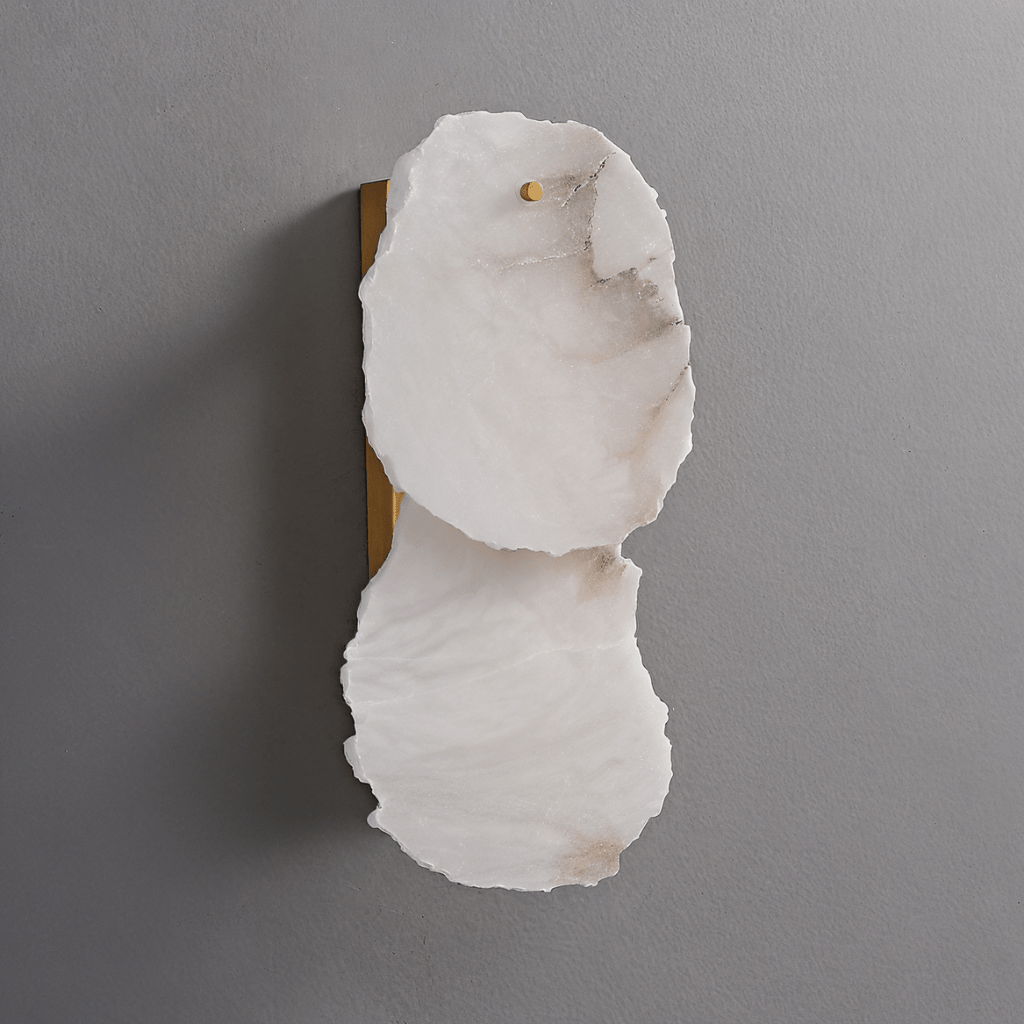 Clérachic two-light wall lamp unlit, white veined alabaster panels on a brushed brass backplate.