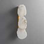 Clérachic three-light wall lamp unlit, three veined alabaster panels pinned to a slim brass backplate.
