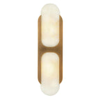 Clérachic Alabaster Wall Sconce in the tall 50 cm size, brass bracket running the full height over honey-toned lit stone.
