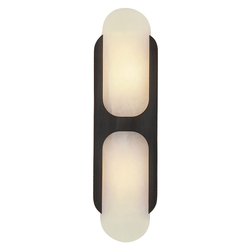 Clérachic Alabaster Wall Sconce in the tall size with a black bracket, the lit stone glowing white between dark metal edges.
