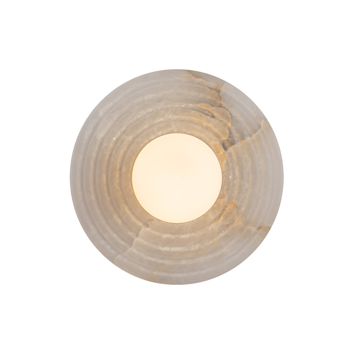 Lit face-on, the Clérachic alabaster sconce glows through the opal globe at its centre while the grey-veined stone rings stay soft.