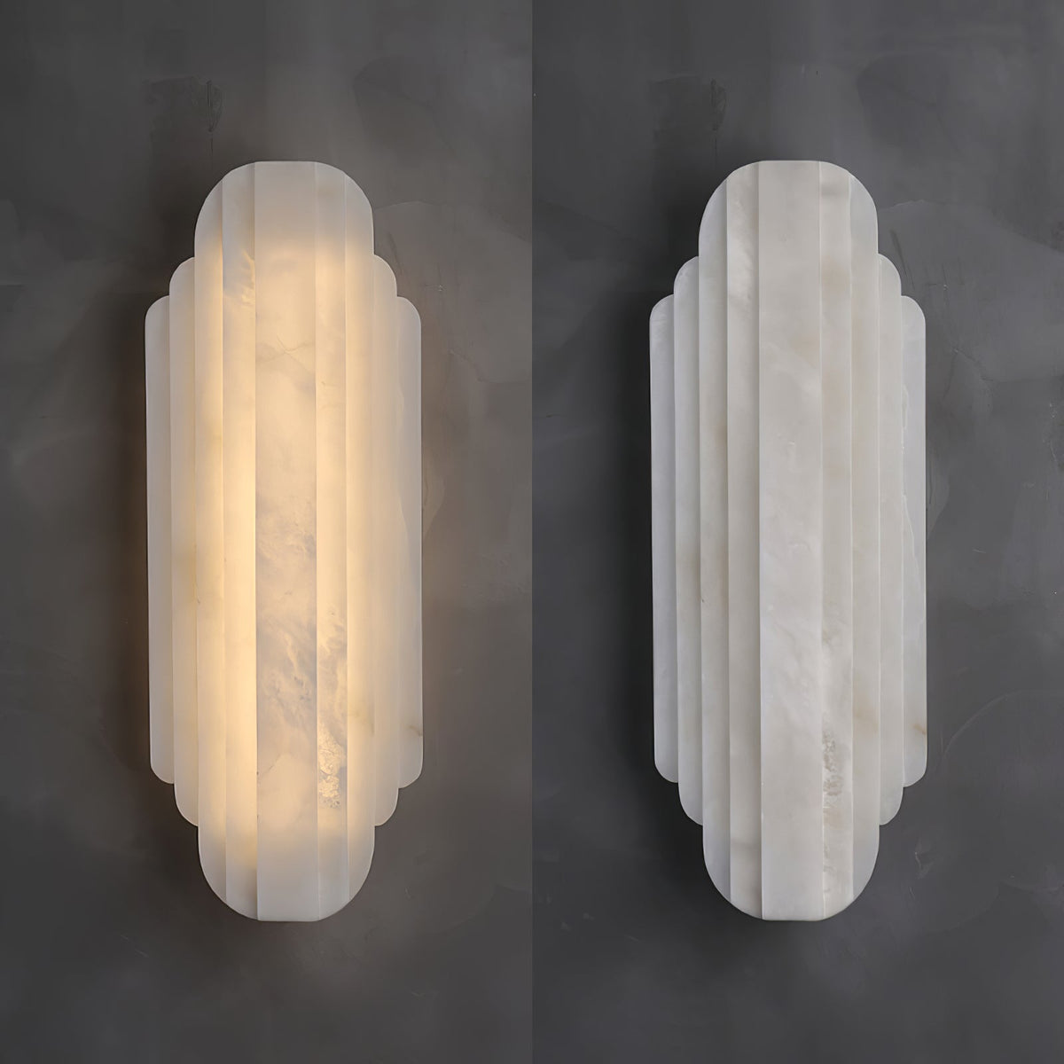Two views of this Clérachic alabaster sconce on a dark grey wall, one glowing warm and one unlit, showing the veining of the stone.