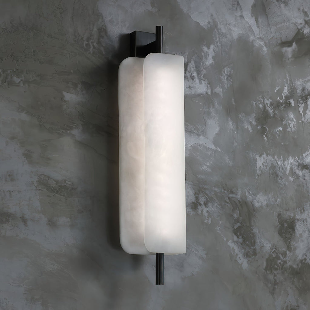 Clérachic Alabaster Wall Sconce viewed from the side, showing how the front plate sits proud of the back one on the dark metal spine.
