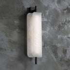 Clérachic Alabaster Wall Sconce viewed from the side, showing how the front plate sits proud of the back one on the dark metal spine.