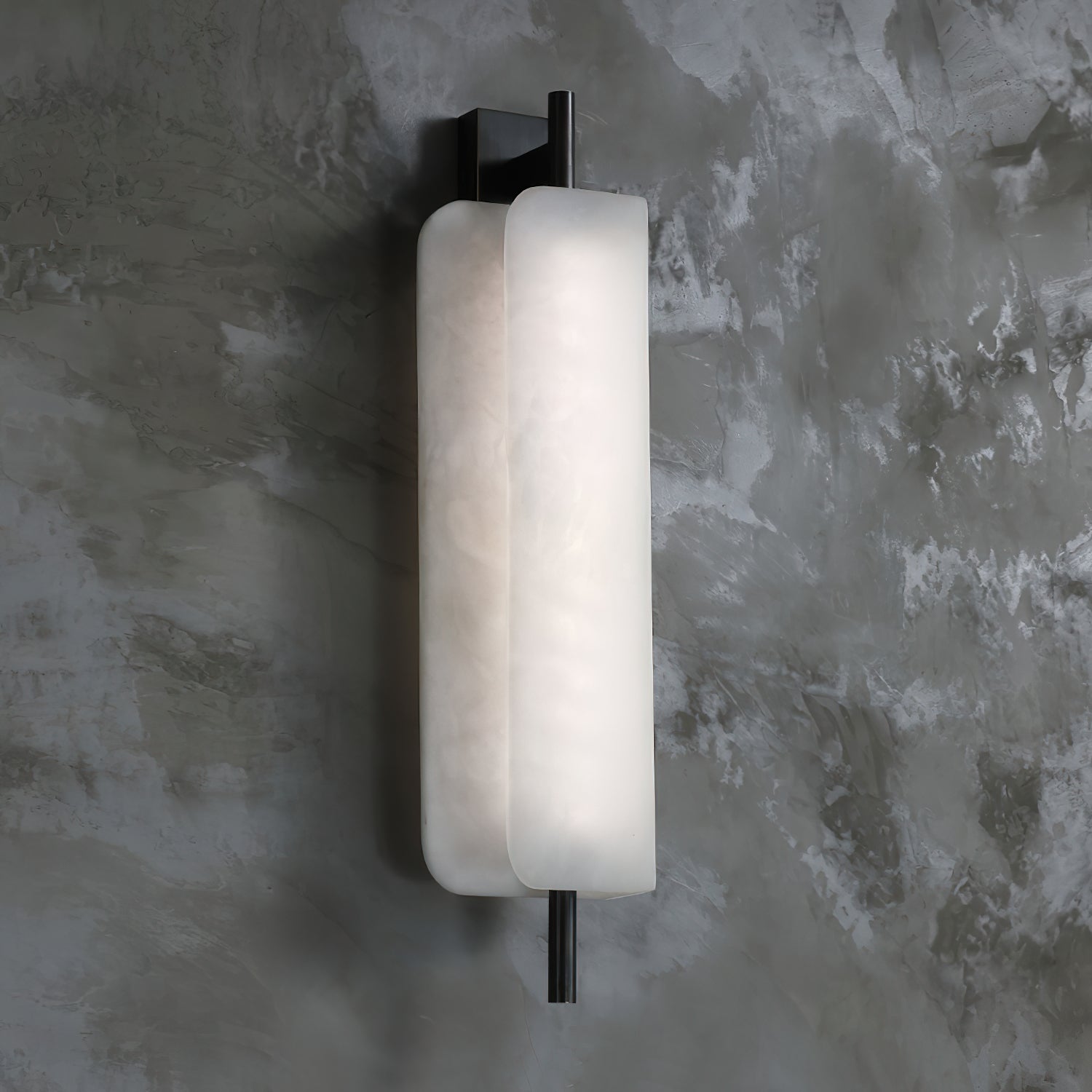 Clérachic Alabaster Wall Sconce viewed from the side, showing how the front plate sits proud of the back one on the dark metal spine.