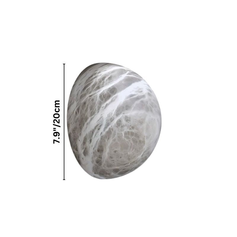 Clérachic pebble-shaped alabaster wall sconce on white, with a height line marked 20 cm for the middle size.