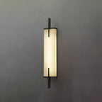 Front view of this lit Clérachic alabaster wall light with a black frame and crossing bars, on a plain dark grey wall.